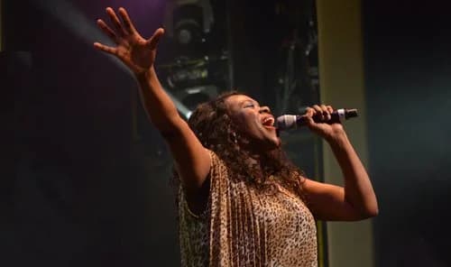 Musician exploring genre combinations with instruments